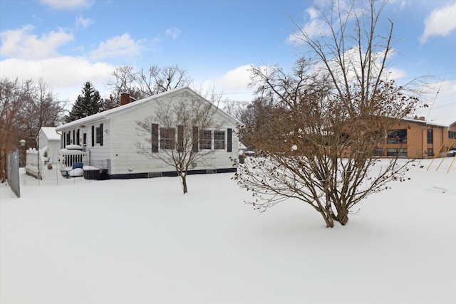 view of snow covered property