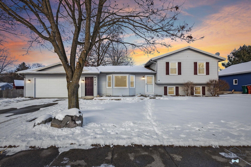 split level home featuring a garage