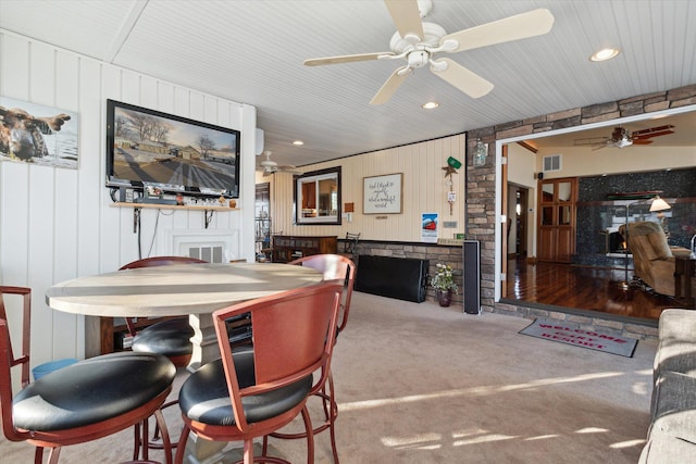 dining room featuring carpet floors and ceiling fan