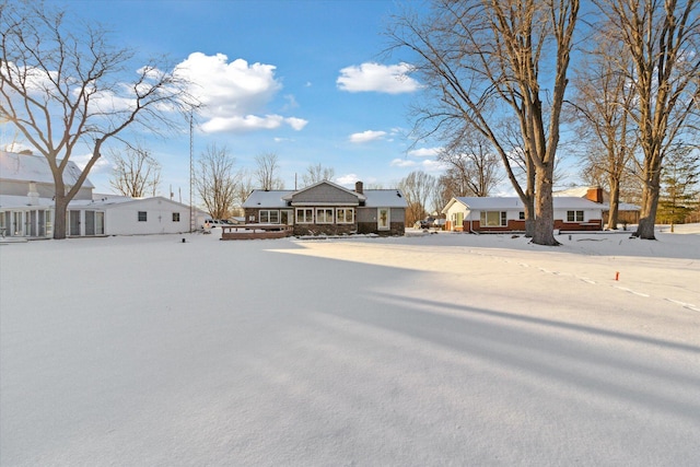 view of yard covered in snow