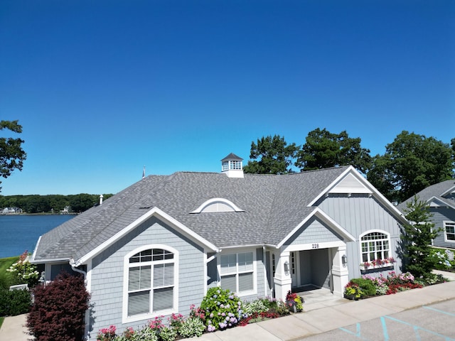 view of front facade featuring a water view