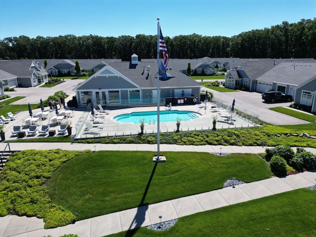 view of pool with a yard and a patio area