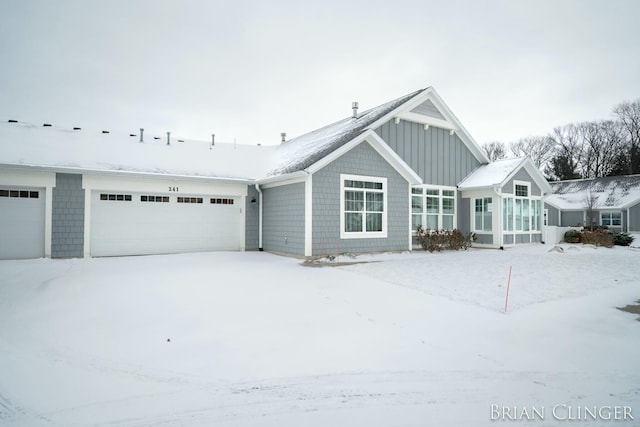 view of front of property with a garage