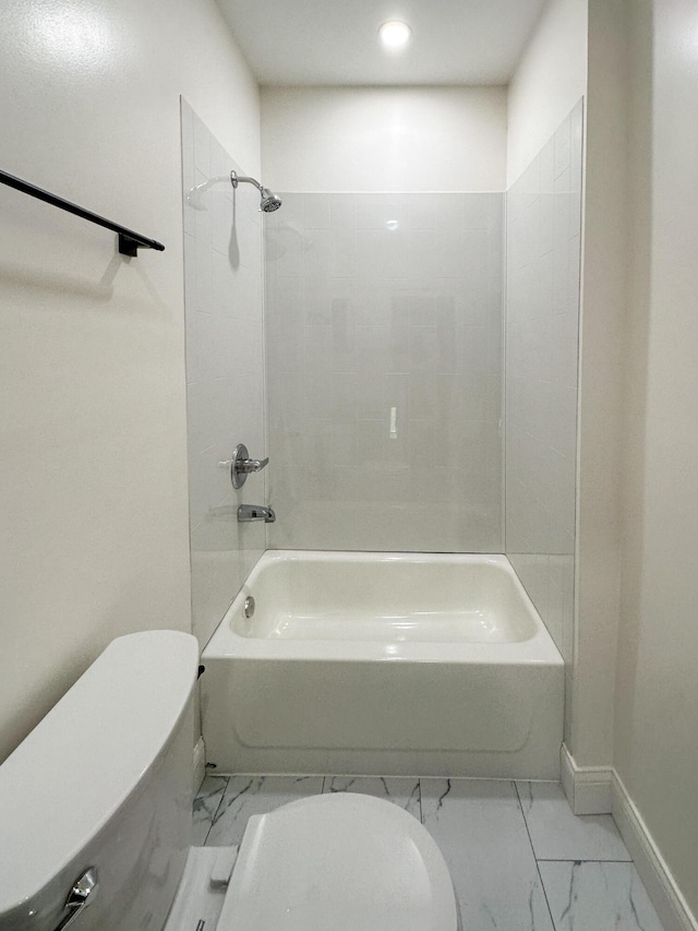 bathroom with toilet and shower / washtub combination