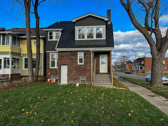 view of front of house with a front lawn