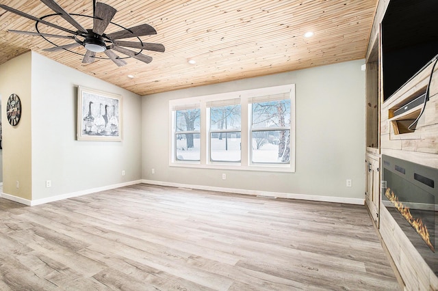 unfurnished living room with light wood-style floors, wood ceiling, baseboards, and ceiling fan