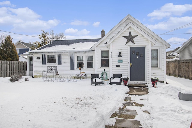 view of snow covered house