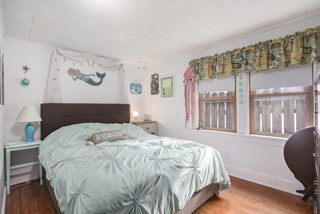 bedroom featuring hardwood / wood-style flooring