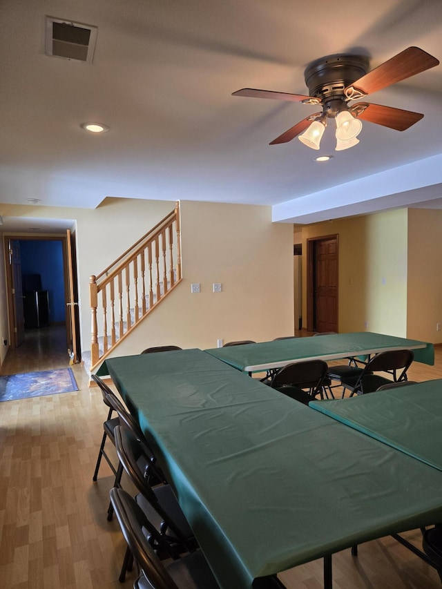 game room featuring ceiling fan and hardwood / wood-style flooring