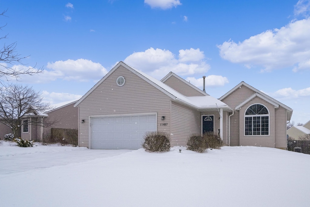 view of property featuring a garage