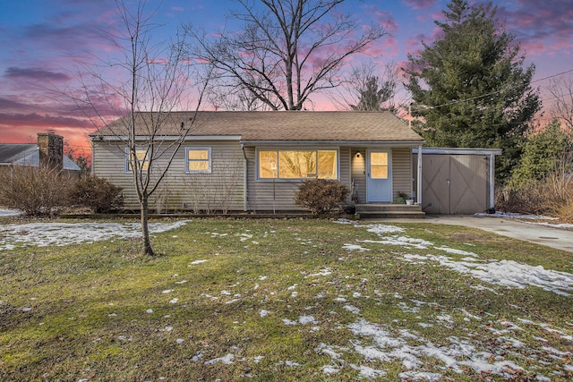 view of front of property with a lawn