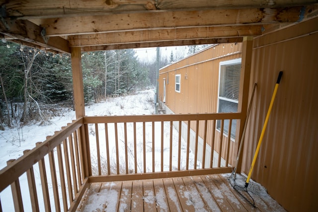 view of snow covered deck