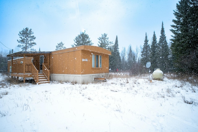 view of snow covered property