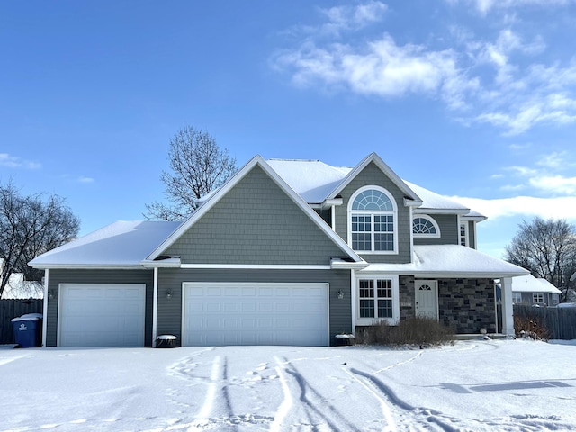 view of front of property with a garage