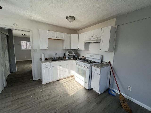 14439 Kent St, Detroit, MI 48213 - kitchen featuring sink, white cabinets, white range with gas stovetop, and a textured ceiling