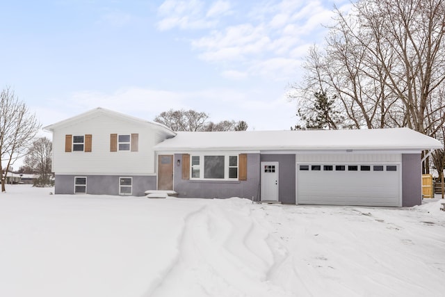 split level home featuring a garage