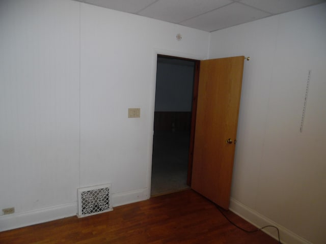 empty room featuring dark hardwood / wood-style floors