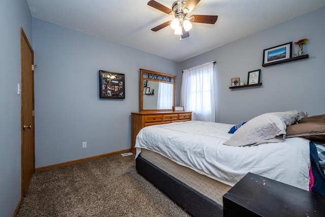 bedroom featuring ceiling fan and carpet floors