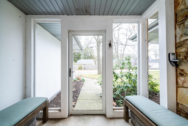 doorway to outside featuring a wealth of natural light