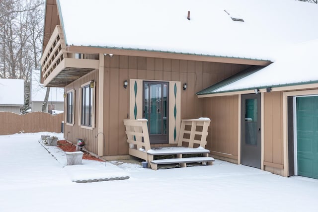 view of snow covered property