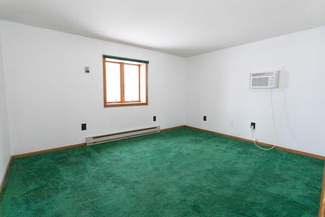 carpeted empty room featuring a baseboard heating unit and a wall mounted air conditioner