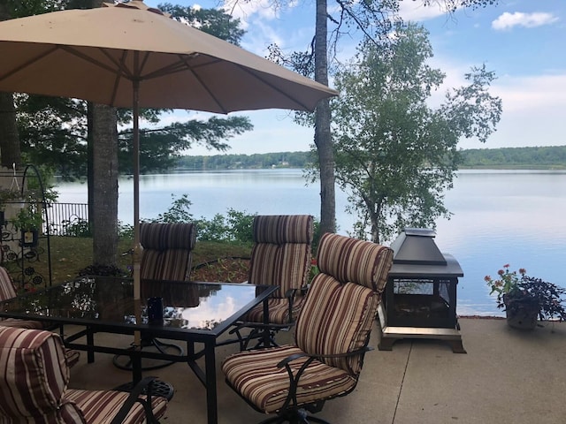 view of patio / terrace with a water view