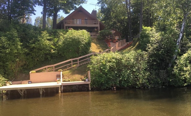 exterior space with a water view