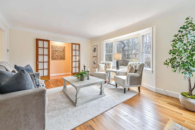 living room with light hardwood / wood-style floors