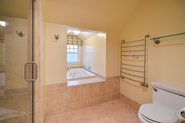 bathroom featuring radiator heating unit, independent shower and bath, lofted ceiling, tile patterned flooring, and toilet