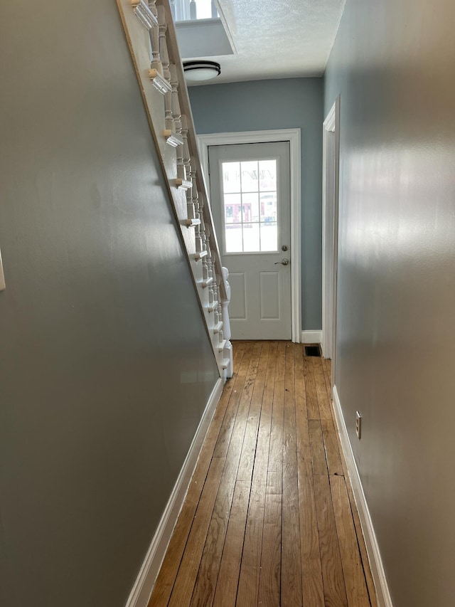 doorway featuring light hardwood / wood-style flooring