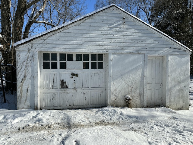 view of snow covered garage