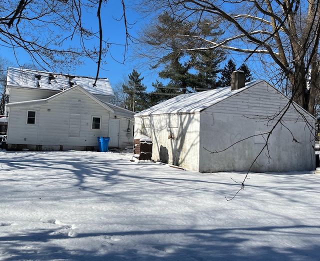 view of snow covered property