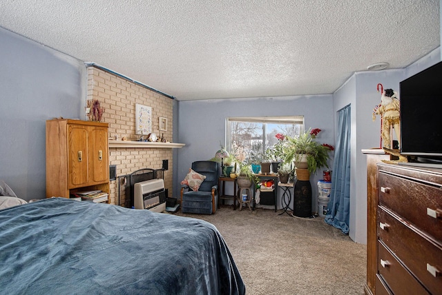 carpeted bedroom with a brick fireplace, heating unit, and a textured ceiling