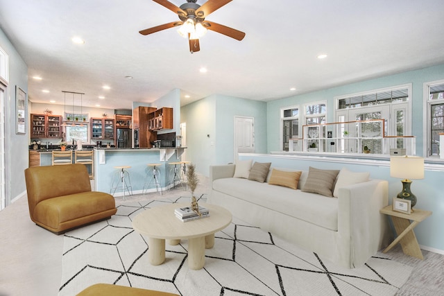 living room featuring ceiling fan