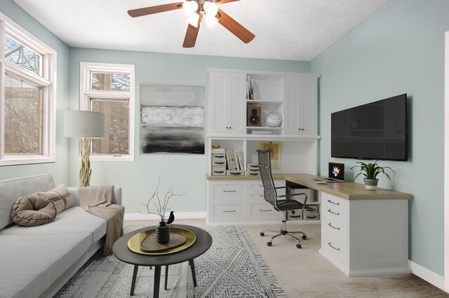 office with ceiling fan and light colored carpet