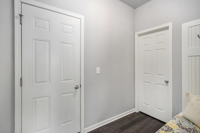 interior space with dark hardwood / wood-style flooring