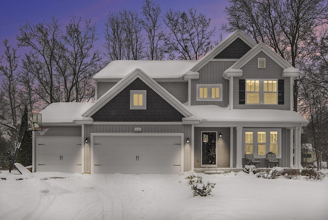 craftsman-style home with a garage