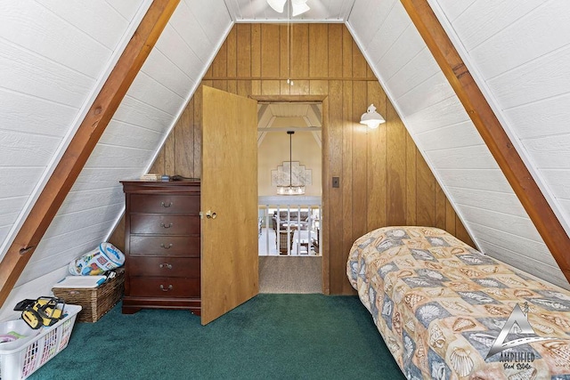 unfurnished bedroom with dark carpet, wood walls, and vaulted ceiling