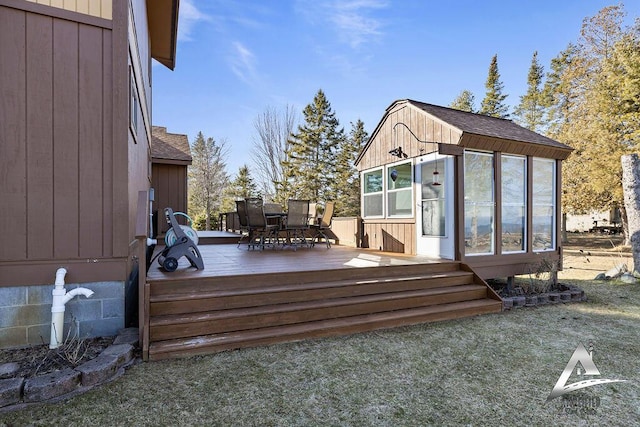 wooden deck with a yard