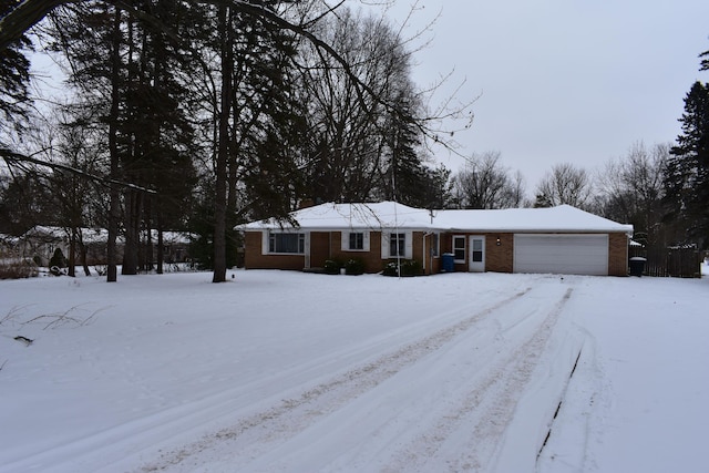 ranch-style house featuring a garage