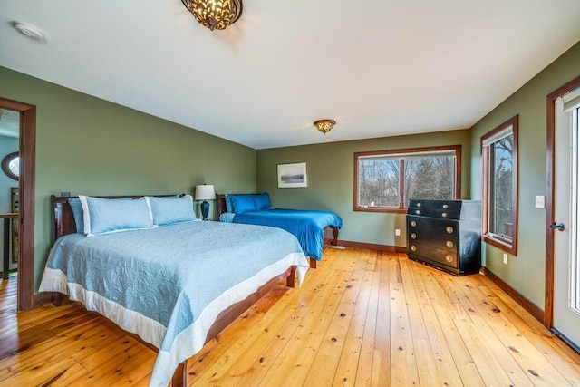 bedroom with light hardwood / wood-style floors