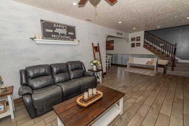 living room with ceiling fan