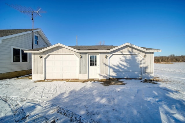 ranch-style home featuring a garage