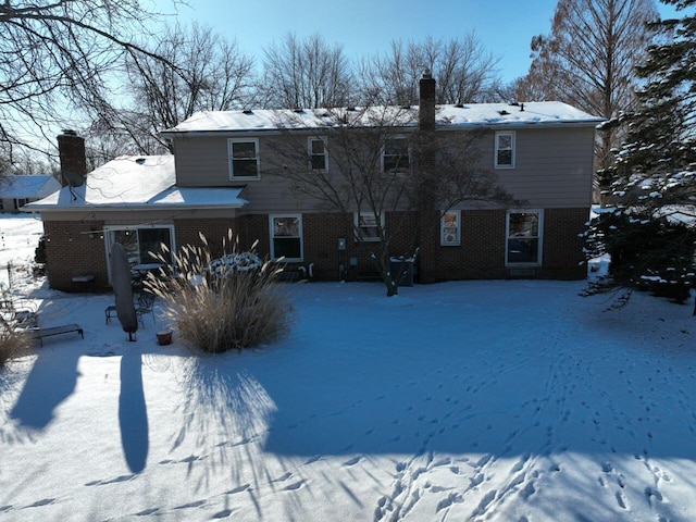 view of snow covered property