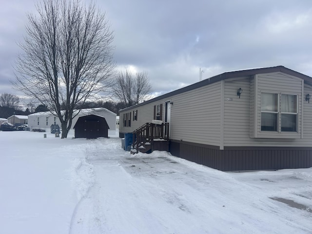 view of snow covered property