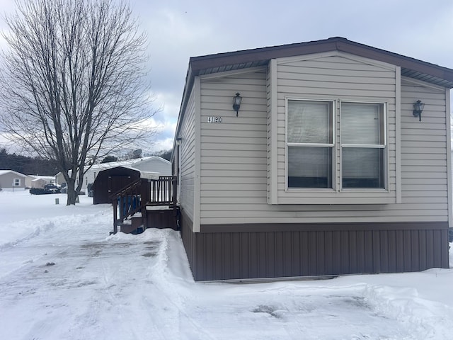 view of snow covered property