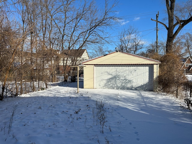 view of snow covered garage