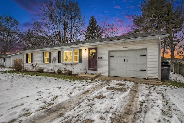 single story home with a garage