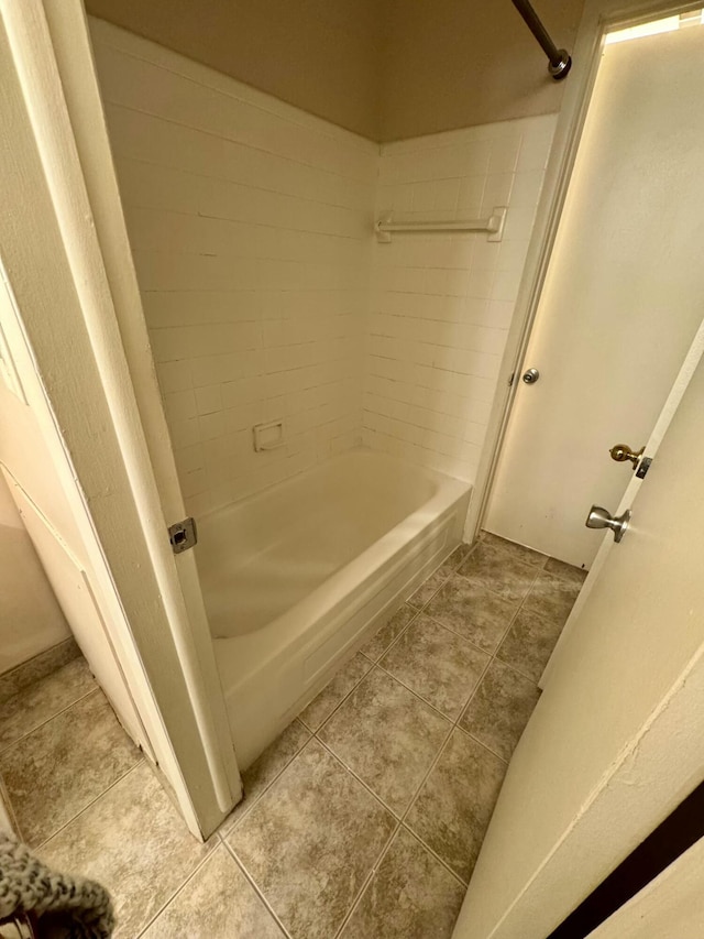 bathroom featuring tile patterned floors and plus walk in shower