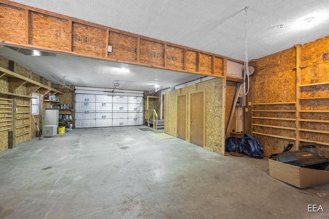 garage featuring refrigerator